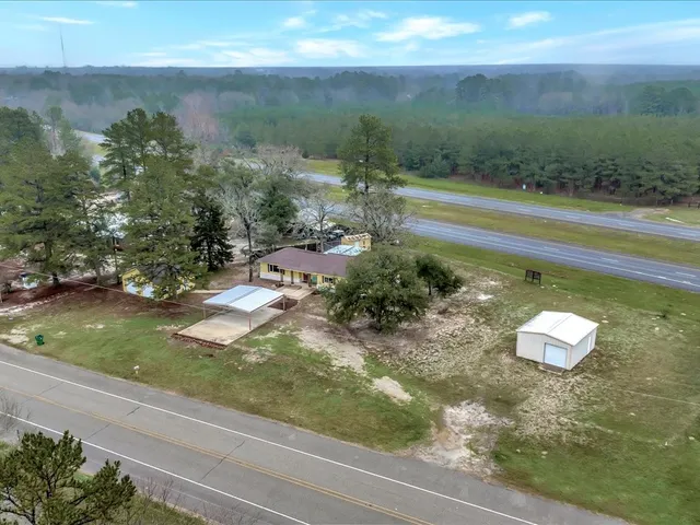 a view of a garden with a lake