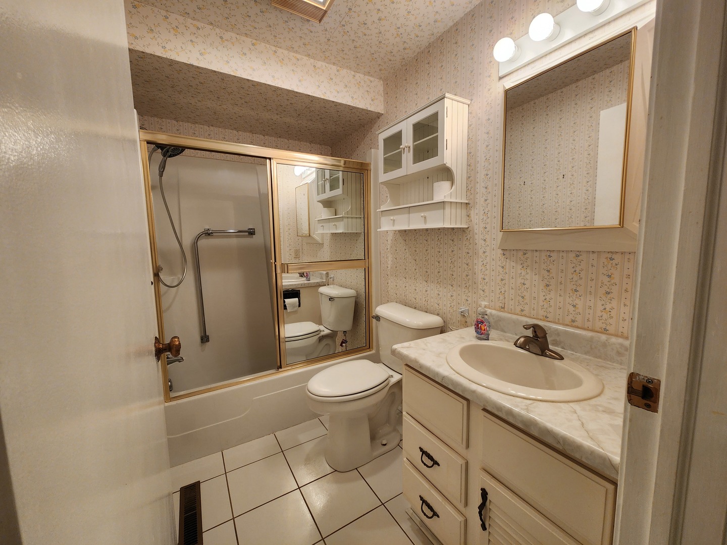 1050 5 South Nelson Avenue, Unit 4 Kankakee, IL 60901 - Photo 20 of 29 a bathroom with a granite countertop sink toilet and shower