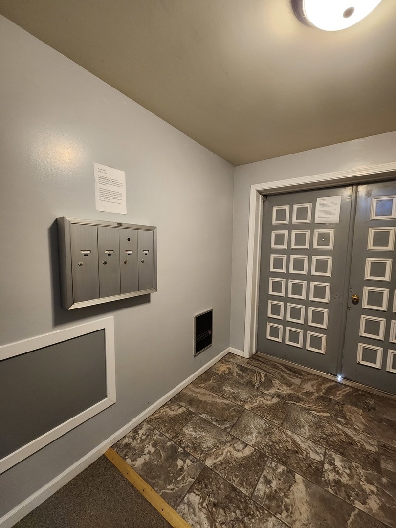 1050 5 South Nelson Avenue, Unit 4 Kankakee, IL 60901 - Photo 24 of 29 a view of an empty room with a window