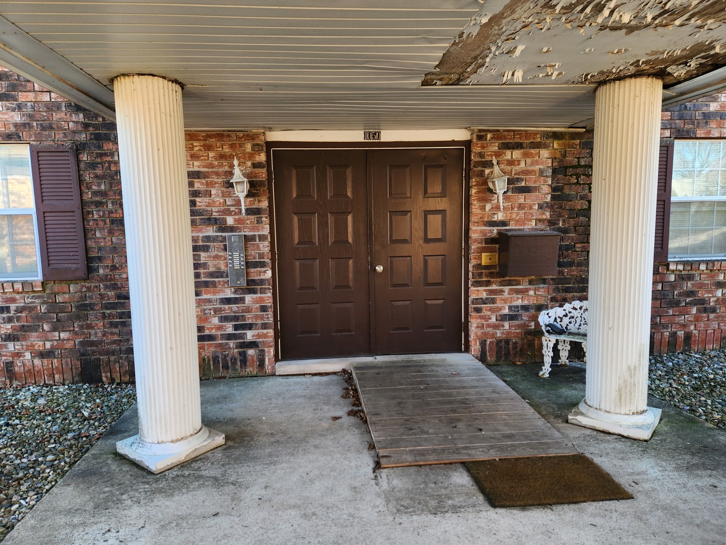 1050 5 South Nelson Avenue, Unit 4 Kankakee, IL 60901 - Photo 26 of 29 a view of a porch with seating space