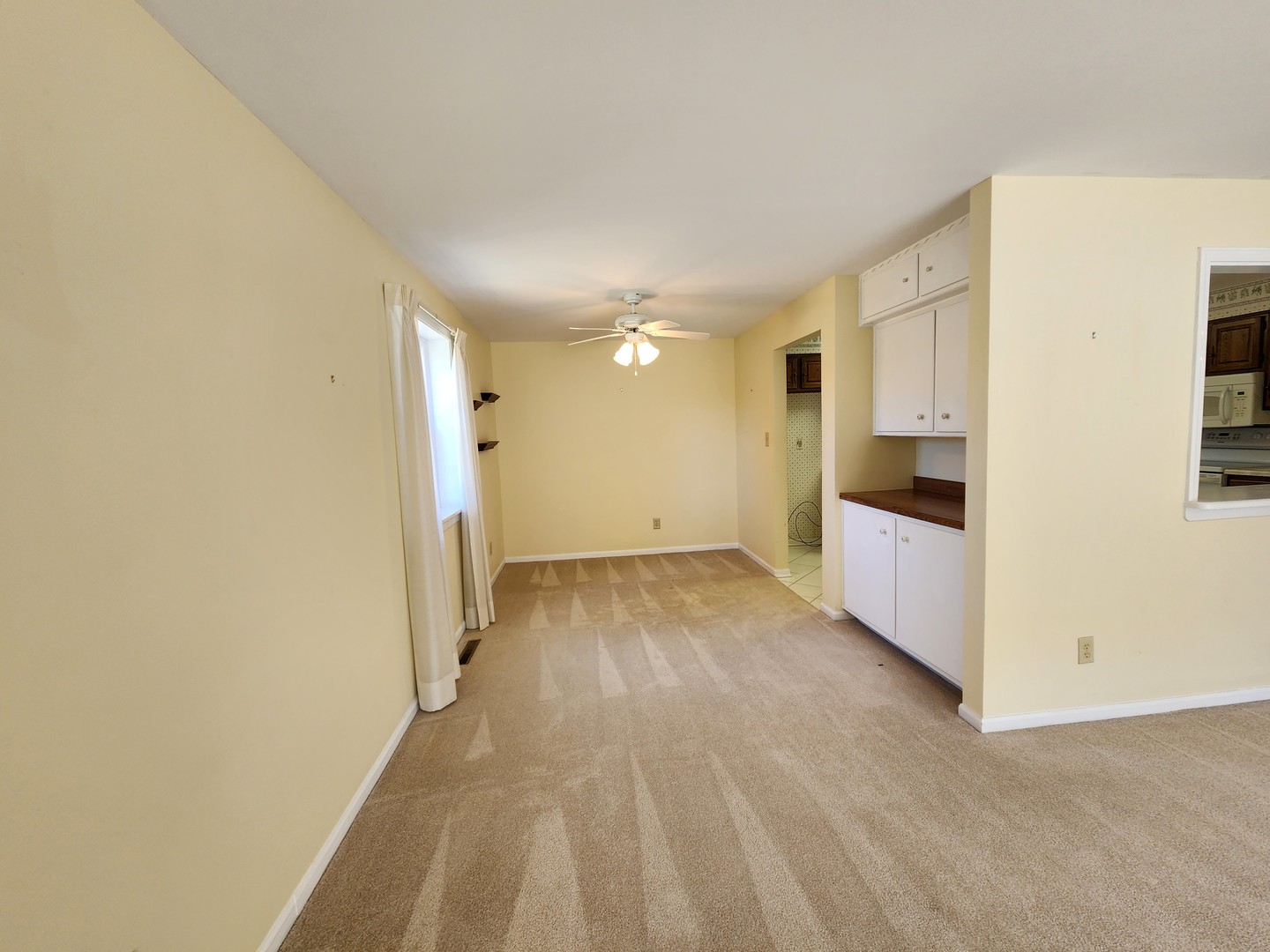 1050 5 South Nelson Avenue, Unit 4 Kankakee, IL 60901 - Photo 5 of 29 a view of a kitchen with a sink and cabinets