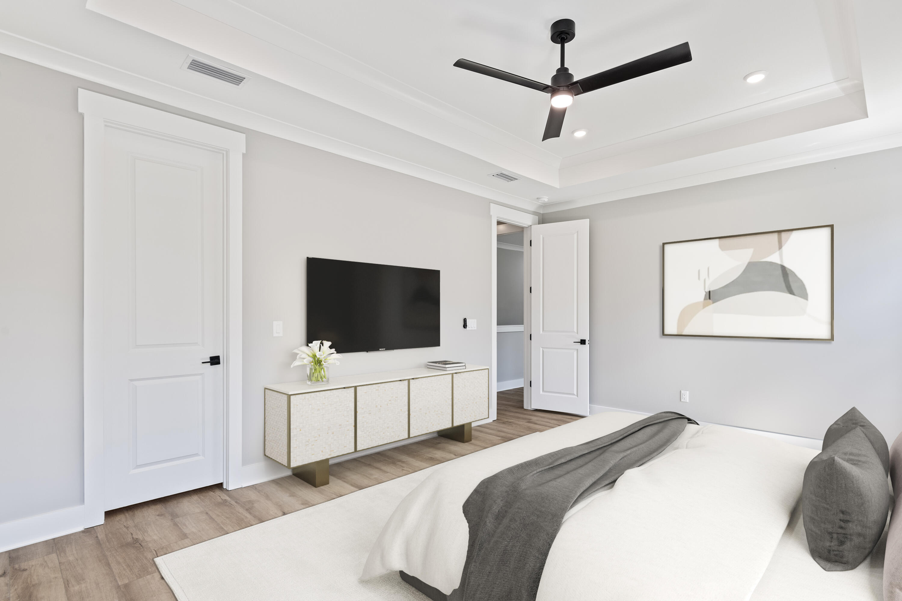 35 Brizo Lane, Unit LOT 1 Santa Rosa Beach, FL 32459 - Photo 6 of 20 a bedroom with a bed and a flat screen tv