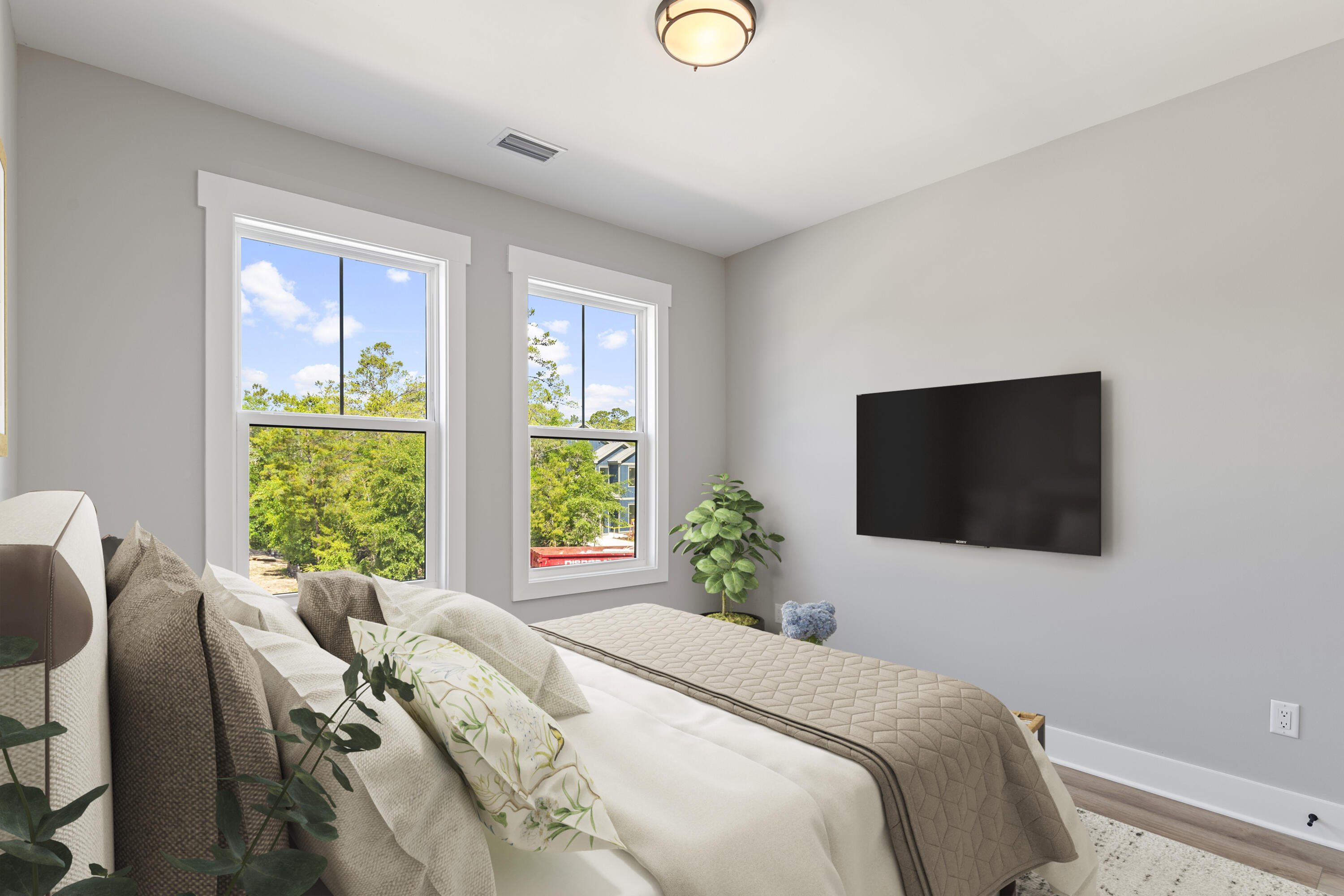 35 Brizo Lane, Unit LOT 1 Santa Rosa Beach, FL 32459 - Photo 8 of 20 a bedroom with a bed and a flat screen tv