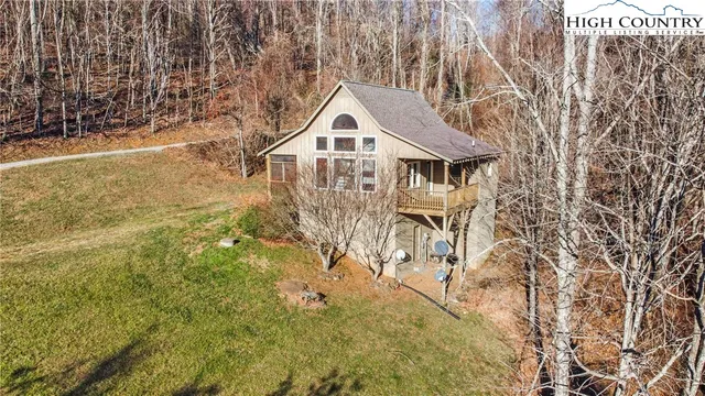 a bench sitting in the middle of a yard