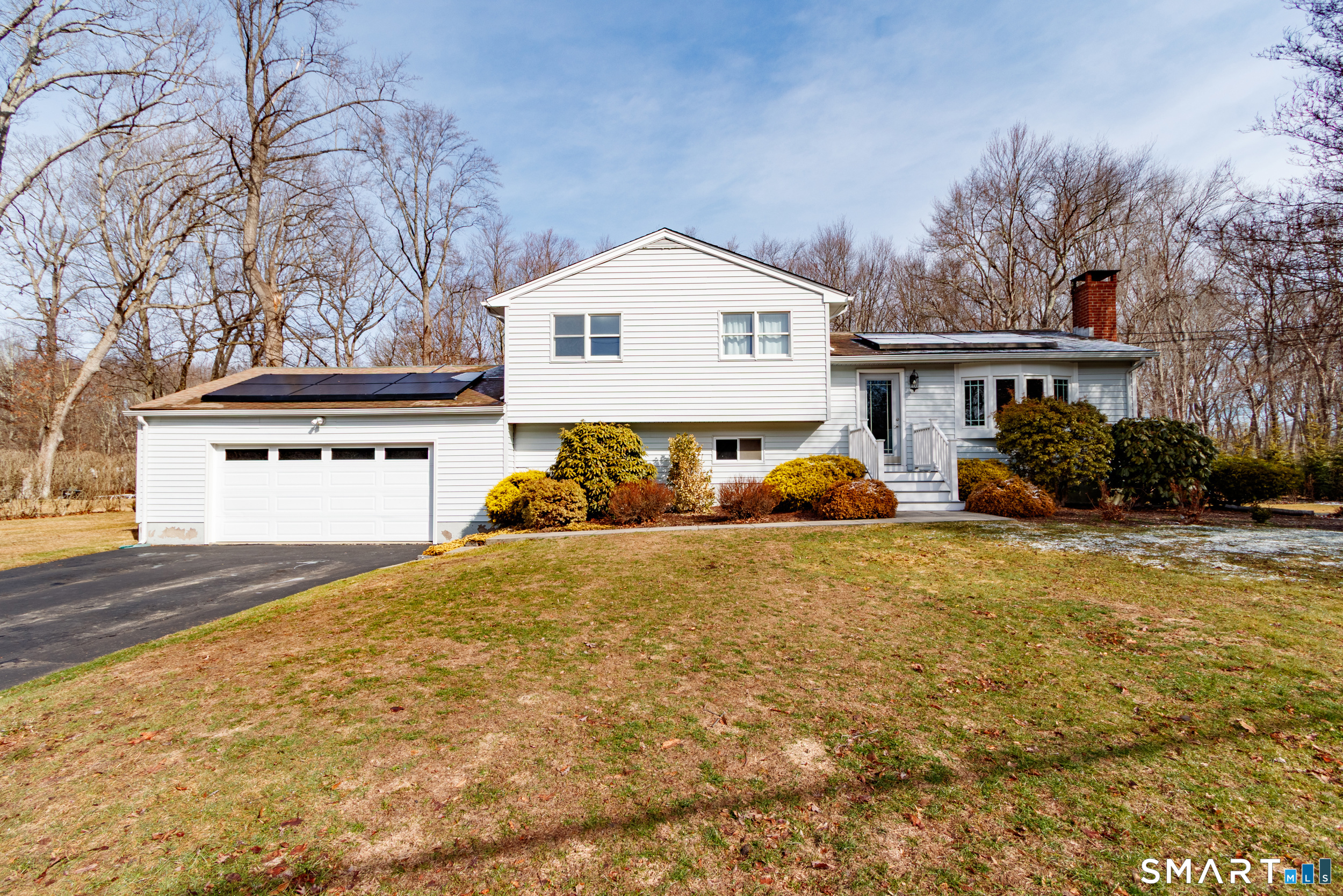 33 Ryegate Terrace Monroe, CT 06468 - Photo 1 of 1 a front view of a house with a yard and garage