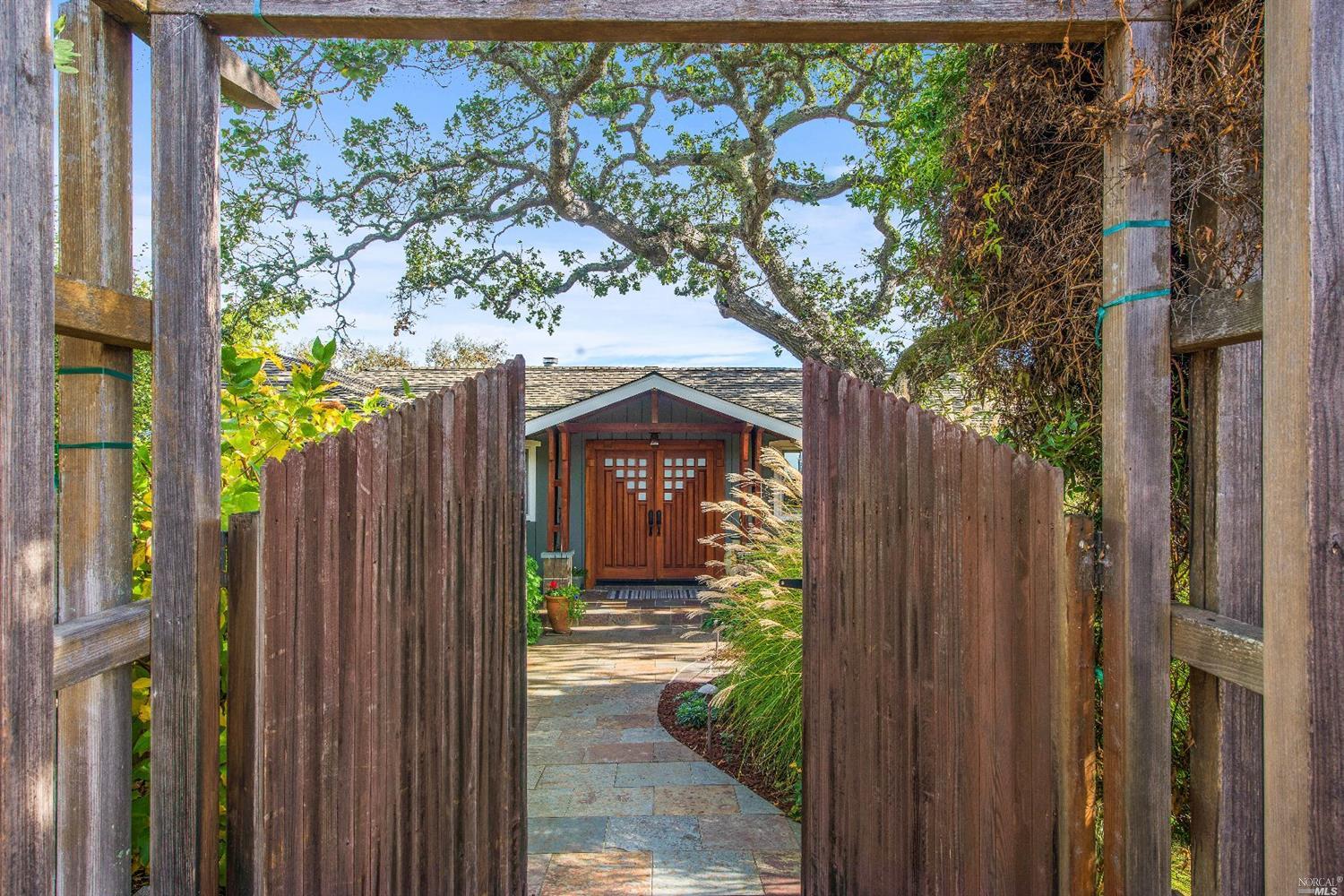 226 Bret Harte Road San Rafael, CA 94901 - Photo 1 of 1 a view of a house with a tree in front of it