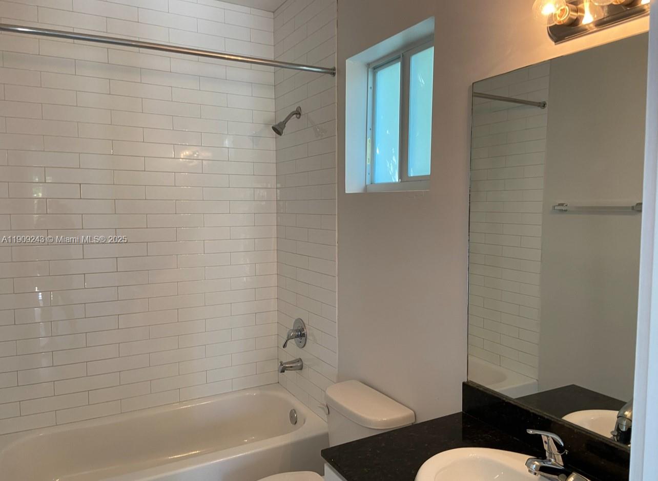 175 East 16th Street, Unit 175 Hialeah, FL 33010 - Photo 8 of 19 a bathroom with a toilet and a shower