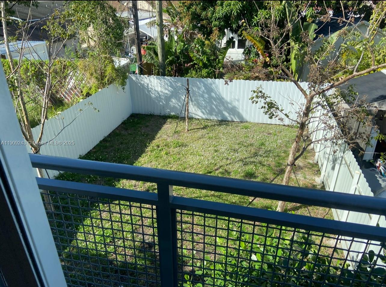 175 East 16th Street, Unit 175 Hialeah, FL 33010 - Photo 9 of 19 a view of a back yard from a balcony