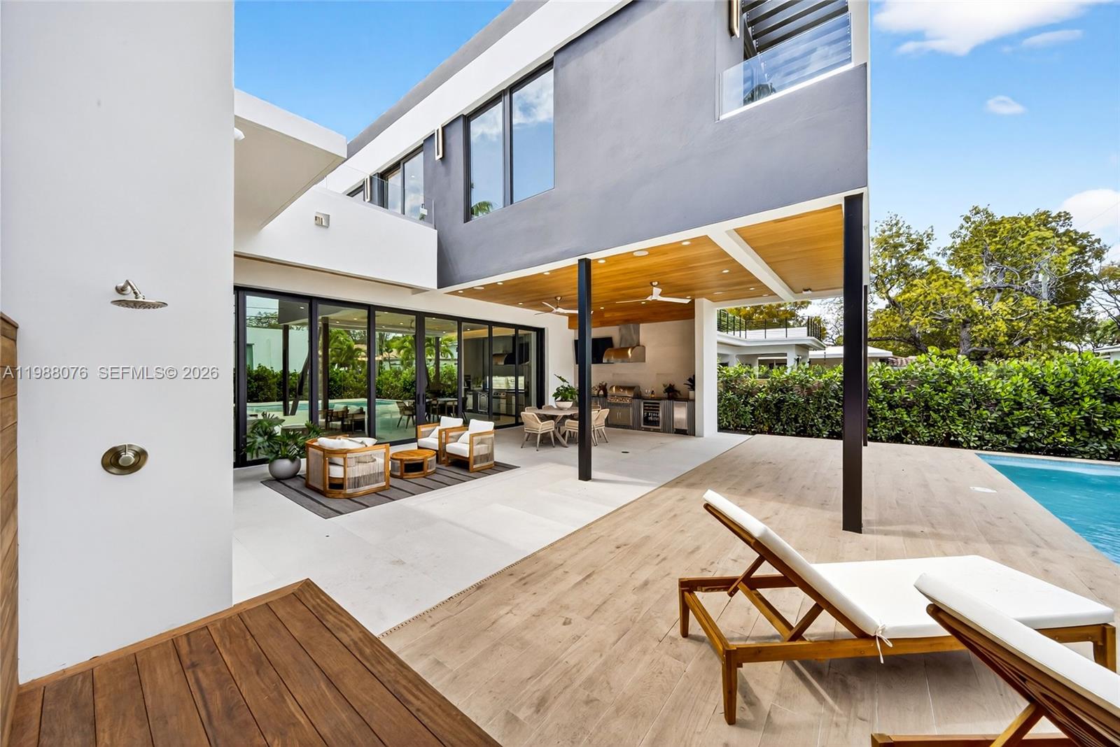 609 Southwest 24th Road Miami, FL 33129 - Photo 16 of 50 a building outdoor space with patio furniture and wooden floor