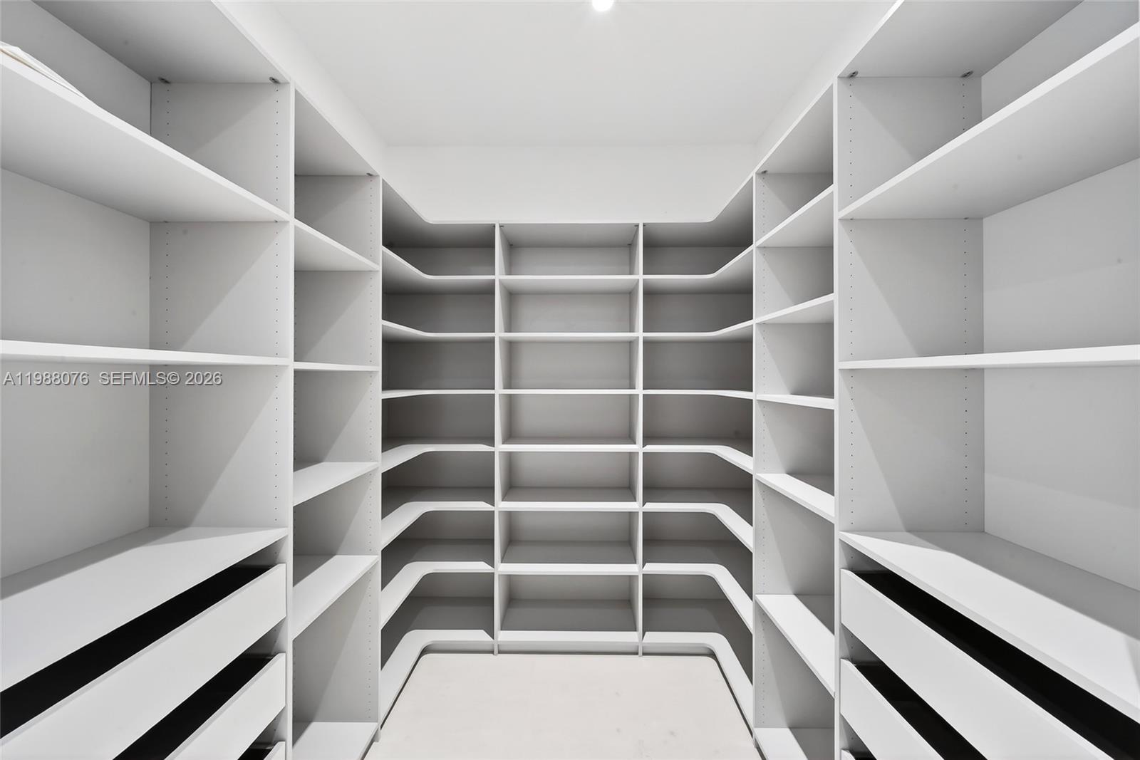 609 Southwest 24th Road Miami, FL 33129 - Photo 43 of 50 a view of an empty room with empty racks