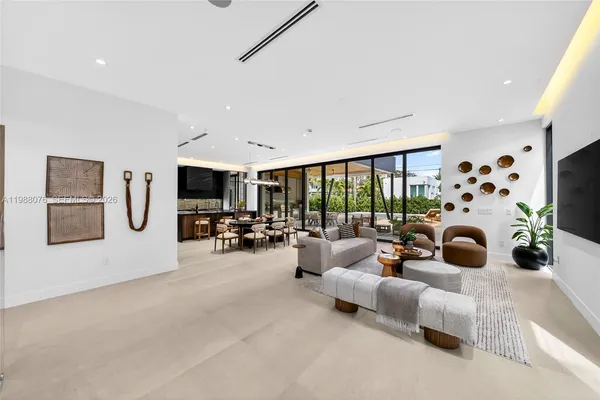 a living room with furniture fireplace and flat screen tv