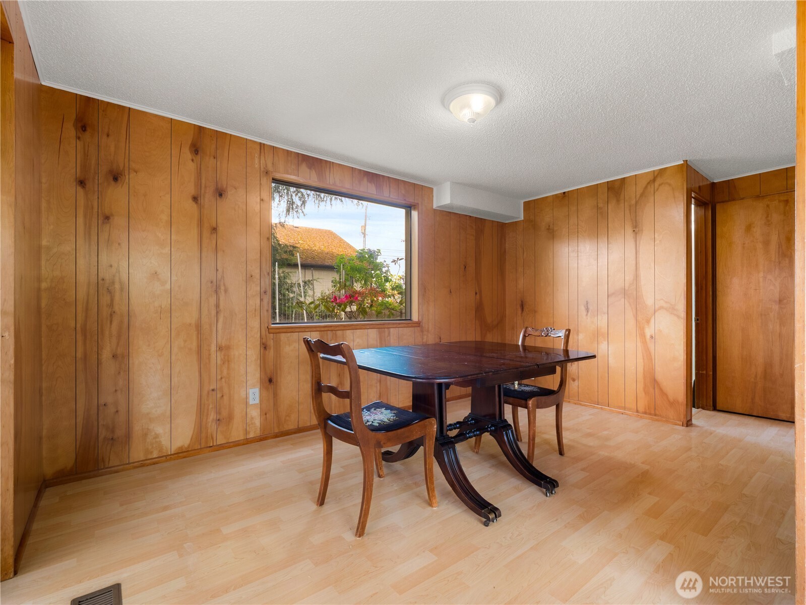 5704 North Ruby Street Tacoma, WA 98407 - Photo 15 of 38 a view of a dining room with furniture and window