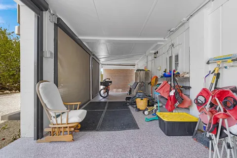a view of a backyard with a patio
