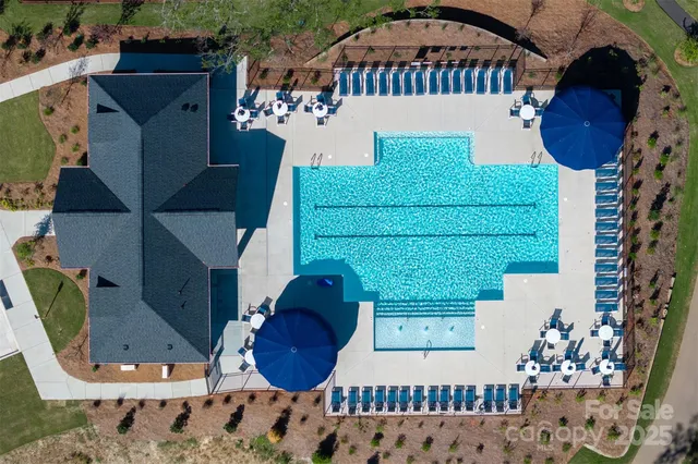 an aerial view of a house having yard