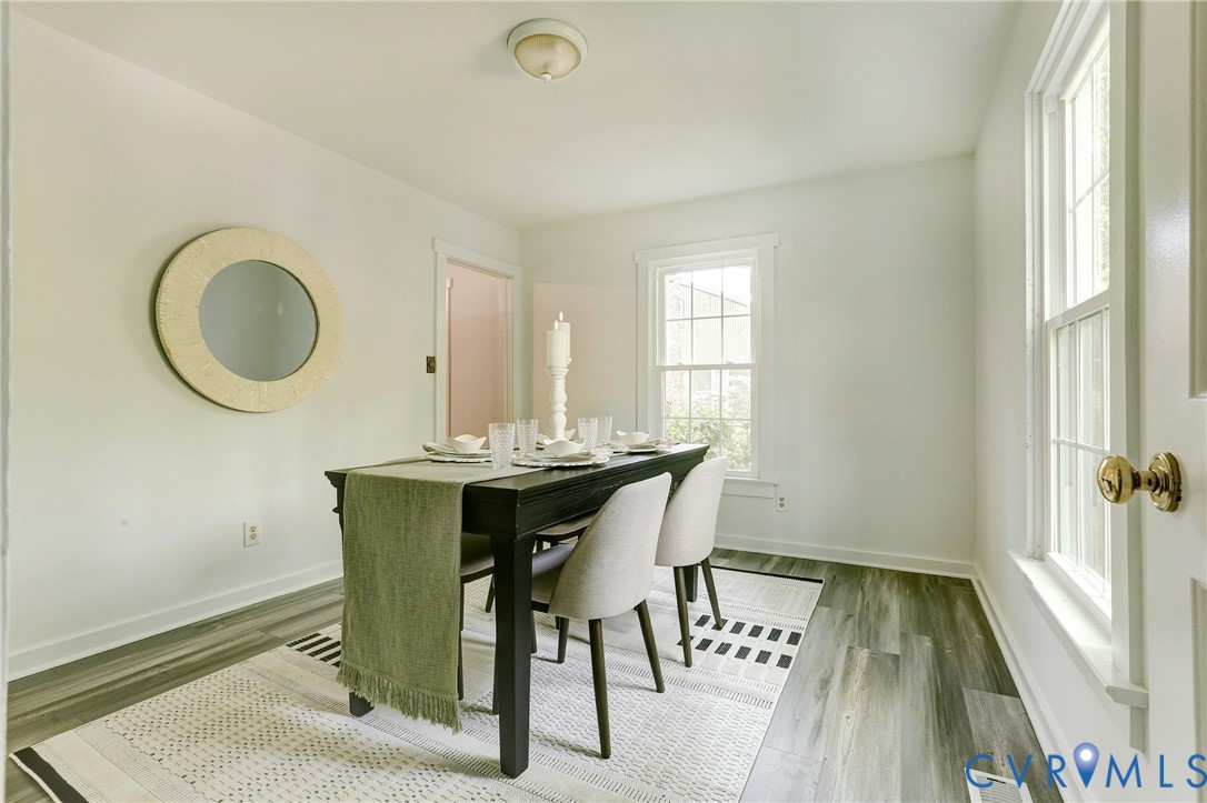 661 Greencastle Road Chesterfield, VA 23236 - Photo 4 of 28 a view of a dining room with furniture and wooden floor