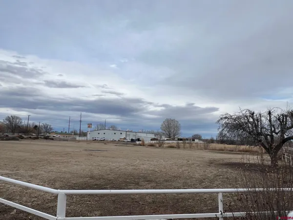 a view of a lake from a yard