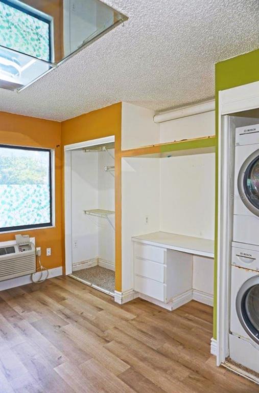 1865 Mazo Manor Road, Unit J5 Lutz, FL 33558 - Photo 17 of 23 a view of a storage & utility room with washer and dryer