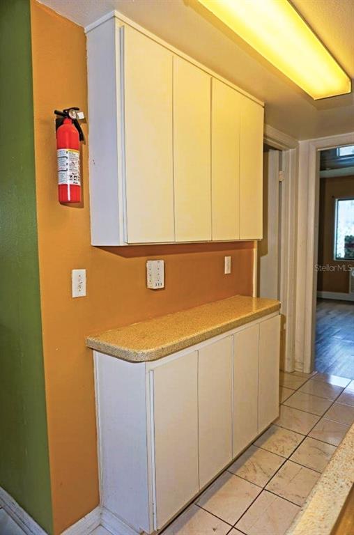 1865 Mazo Manor Road, Unit J5 Lutz, FL 33558 - Photo 5 of 23 a view of utility room