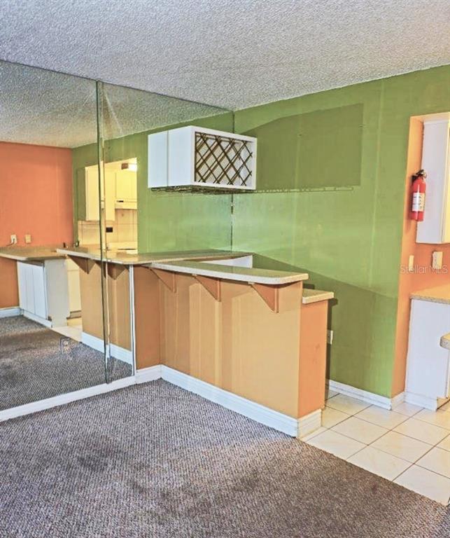 1865 Mazo Manor Road, Unit J5 Lutz, FL 33558 - Photo 7 of 23 a view of a room with window