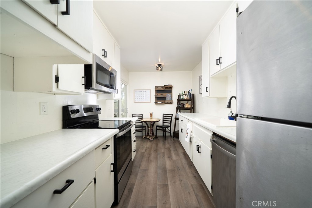 12200 Montecito Road, Unit D312 Seal Beach, CA 90740 - Photo 6 of 29 Kitchen with ample counter space and cabinetry