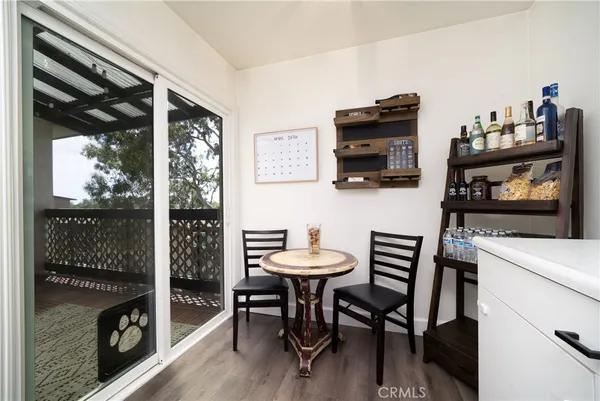 a view of a livingroom with furniture and a flat screen tv