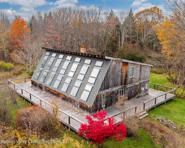 a view of yard with patio