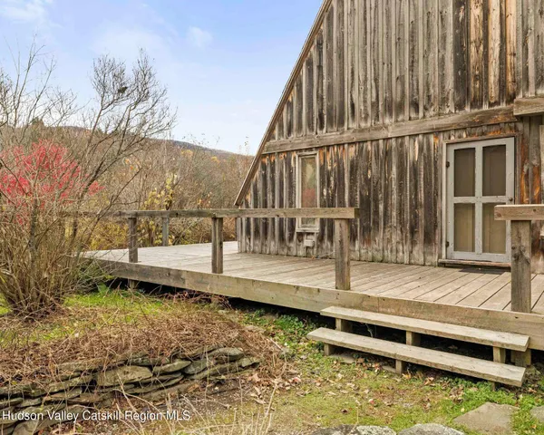 a view of a room with windows