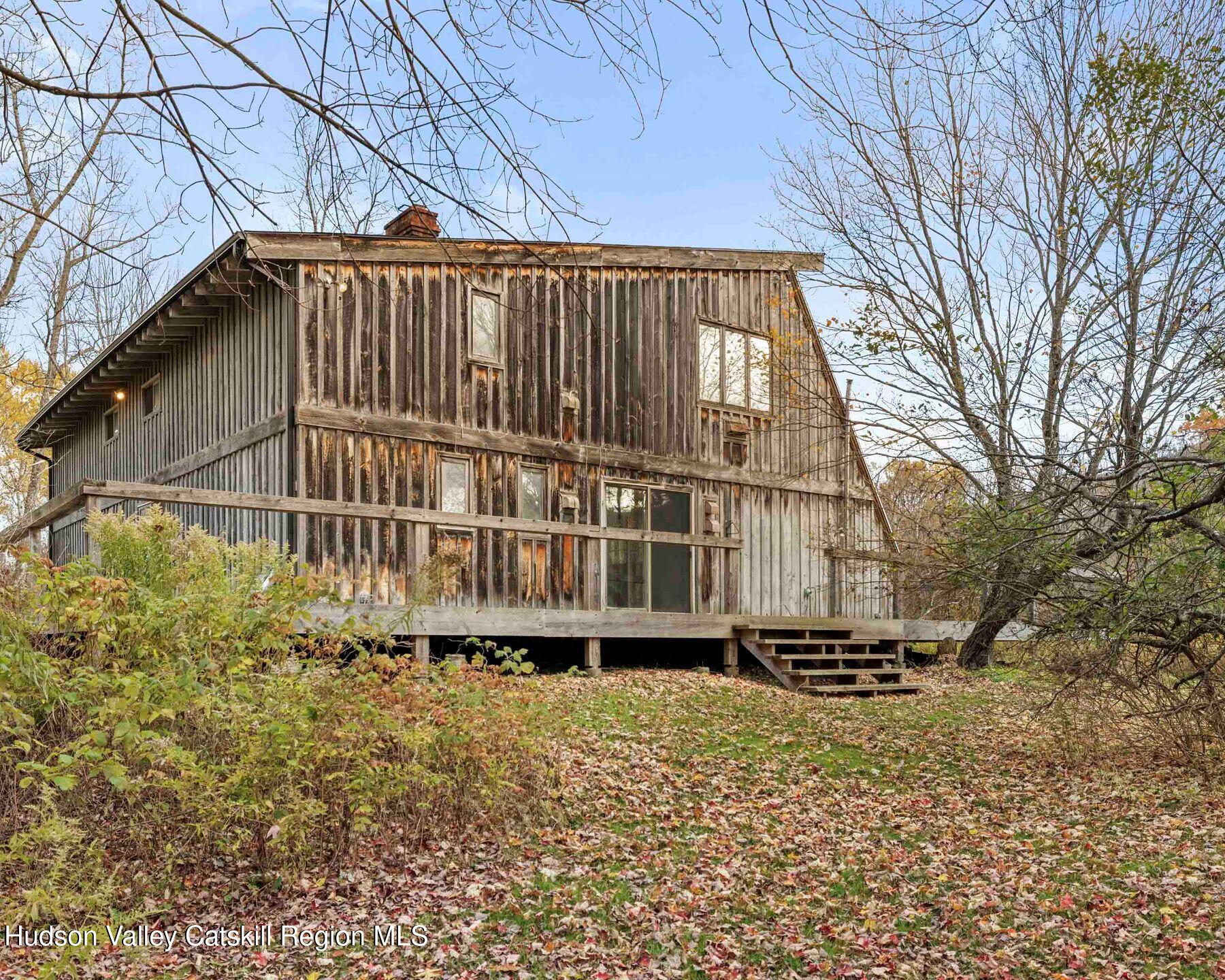 187 Beaver Hill Road Conesville, NY 12076 - Photo 15 of 79 a view of a house with a window