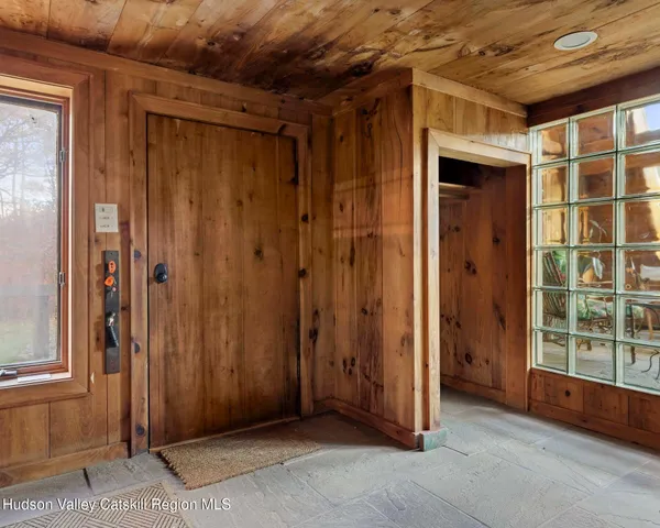 a couple of chairs sitting in front of a building
