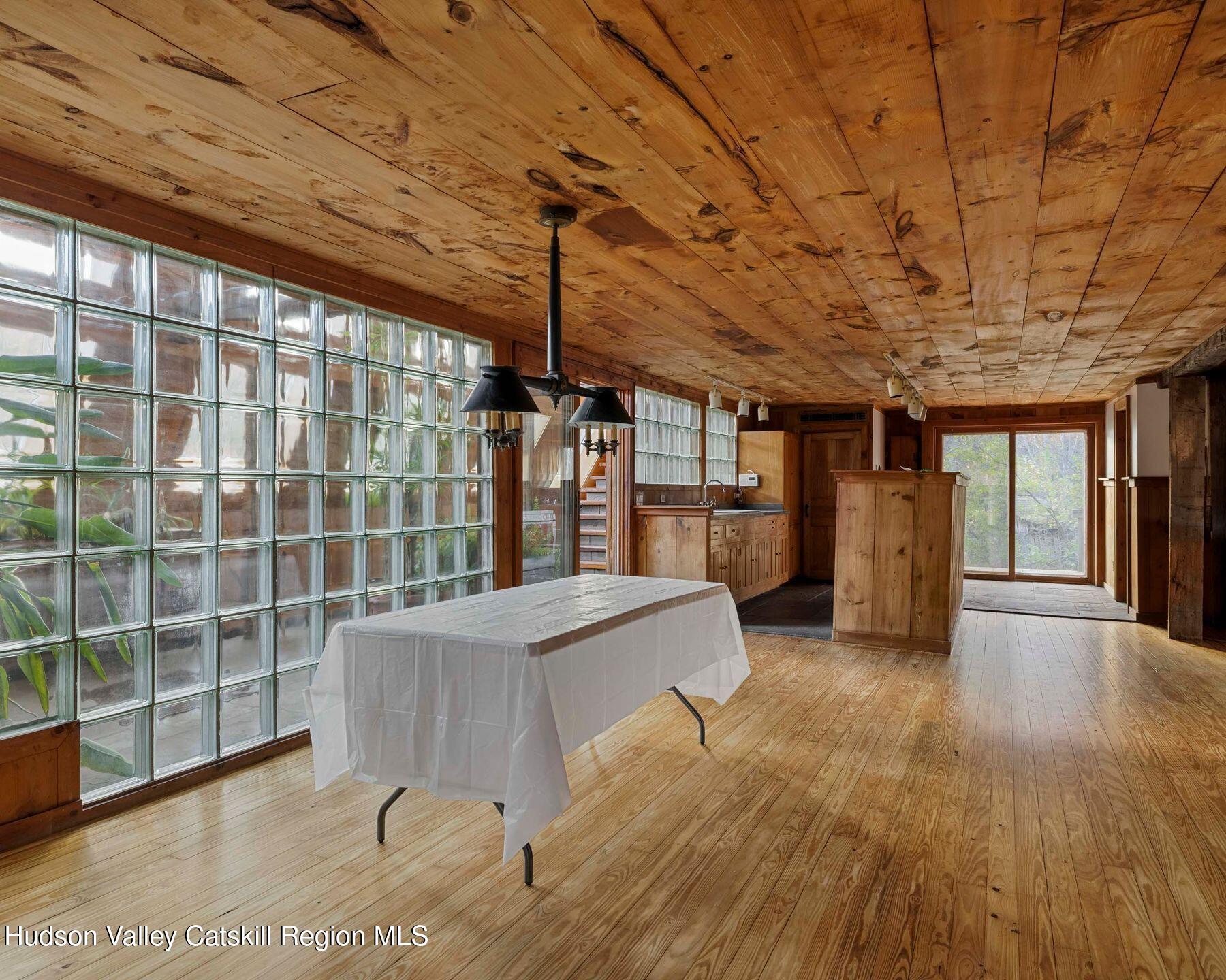 187 Beaver Hill Road Conesville, NY 12076 - Photo 27 of 79 a view of a room with furniture wooden floor and window