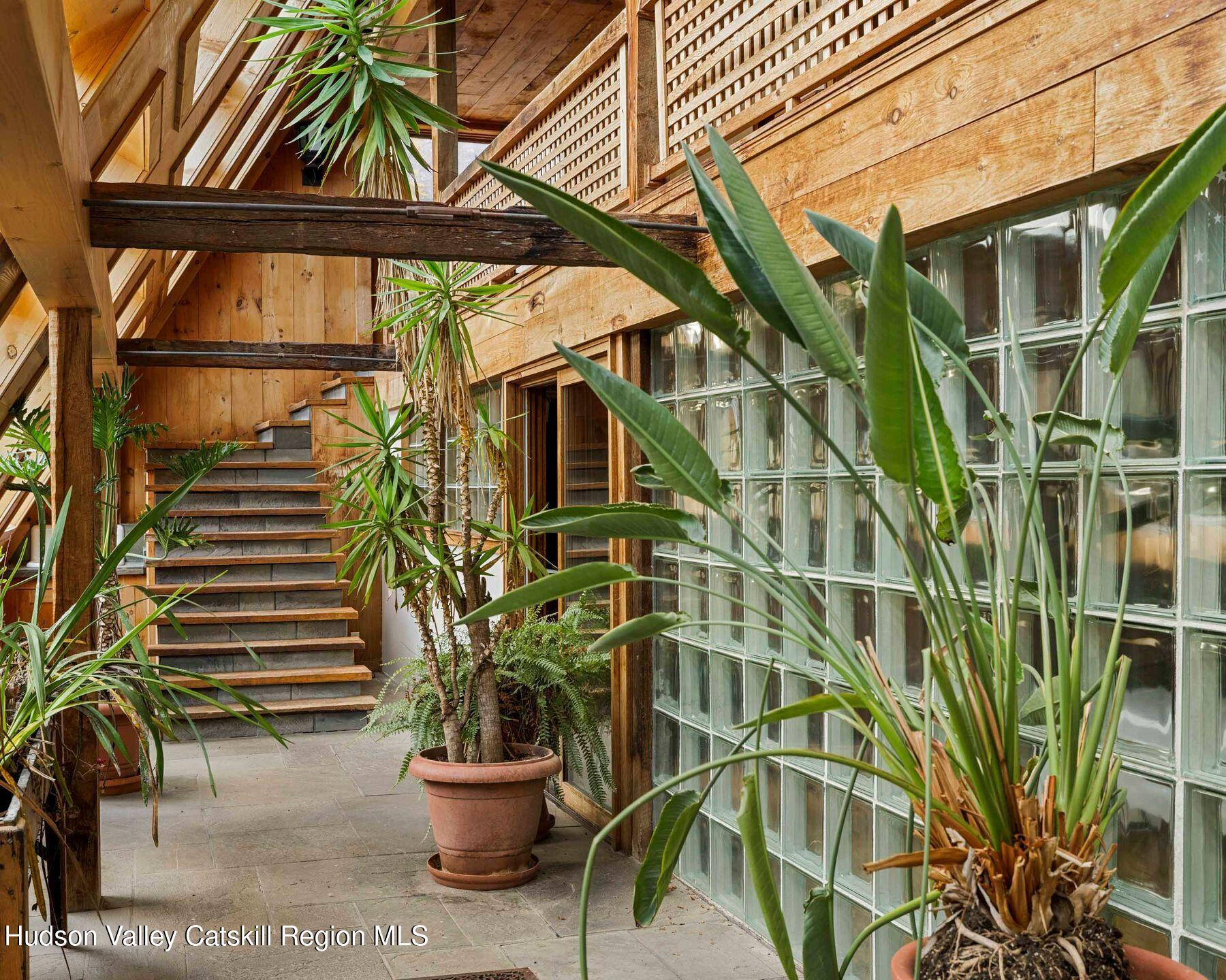 187 Beaver Hill Road Conesville, NY 12076 - Photo 32 of 79 a view of a house with a door and a chair
