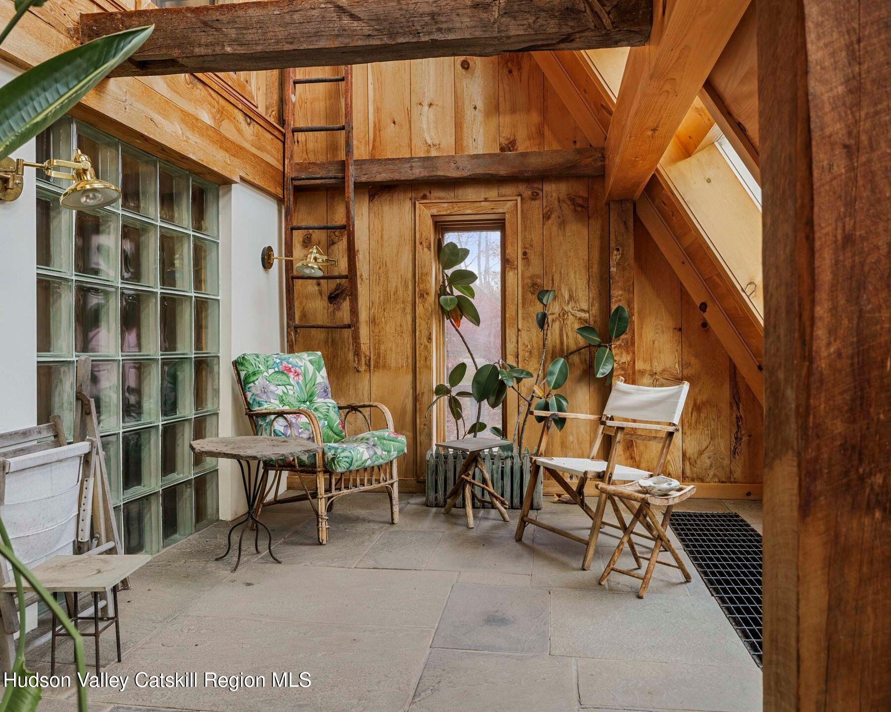 187 Beaver Hill Road Conesville, NY 12076 - Photo 34 of 79 a couple of chairs sitting in front of a building