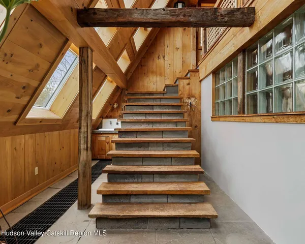 a kitchen with stainless steel appliances granite countertop a stove and cabinets