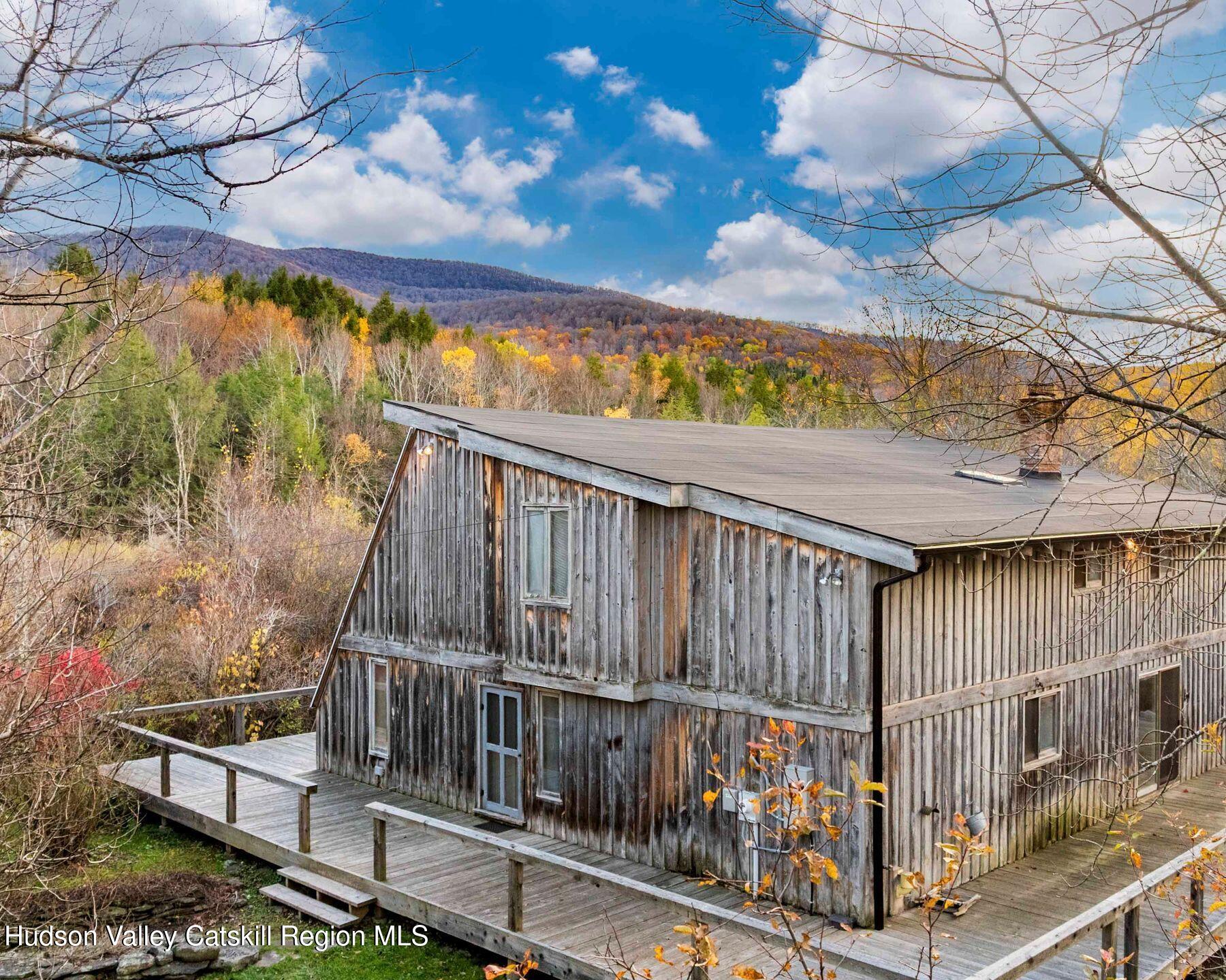 187 Beaver Hill Road Conesville, NY 12076 - Photo 5 of 79 a view of balcony with wooden floor and outdoor seating