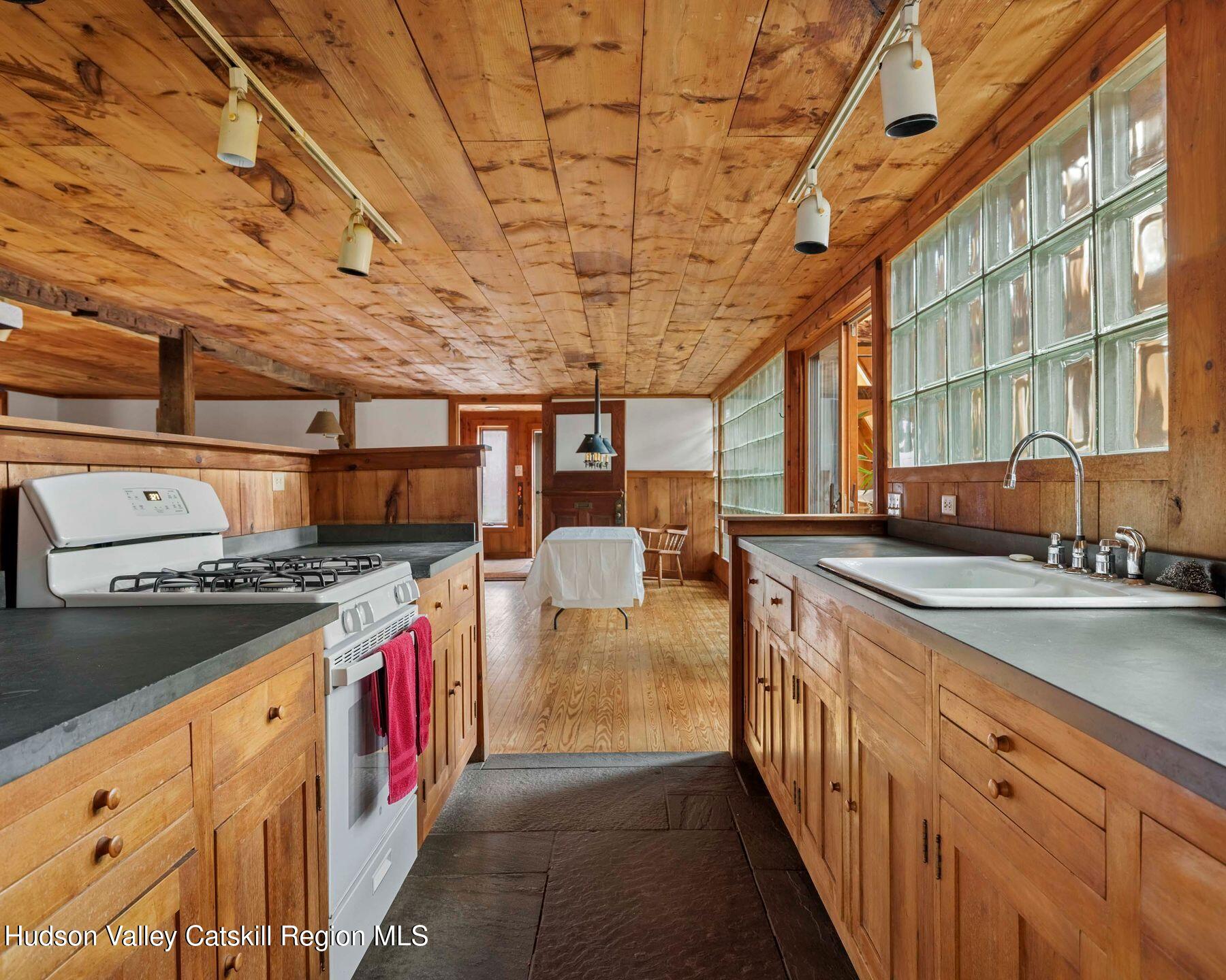 187 Beaver Hill Road Conesville, NY 12076 - Photo 56 of 79 a kitchen with stove and cabinets