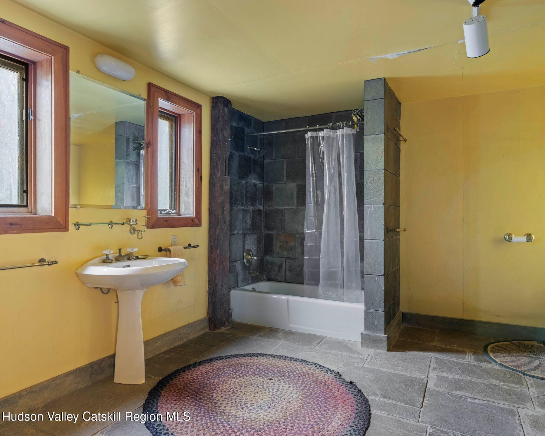 187 Beaver Hill Road Conesville, NY 12076 - Photo 68 of 79 a bathroom with a sink and a mirror