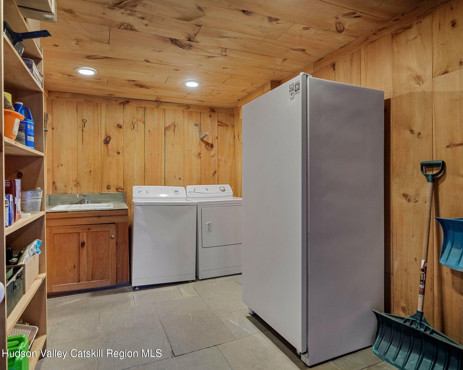 187 Beaver Hill Road Conesville, NY 12076 - Photo 70 of 79 a kitchen with stainless steel appliances a refrigerator and a stove