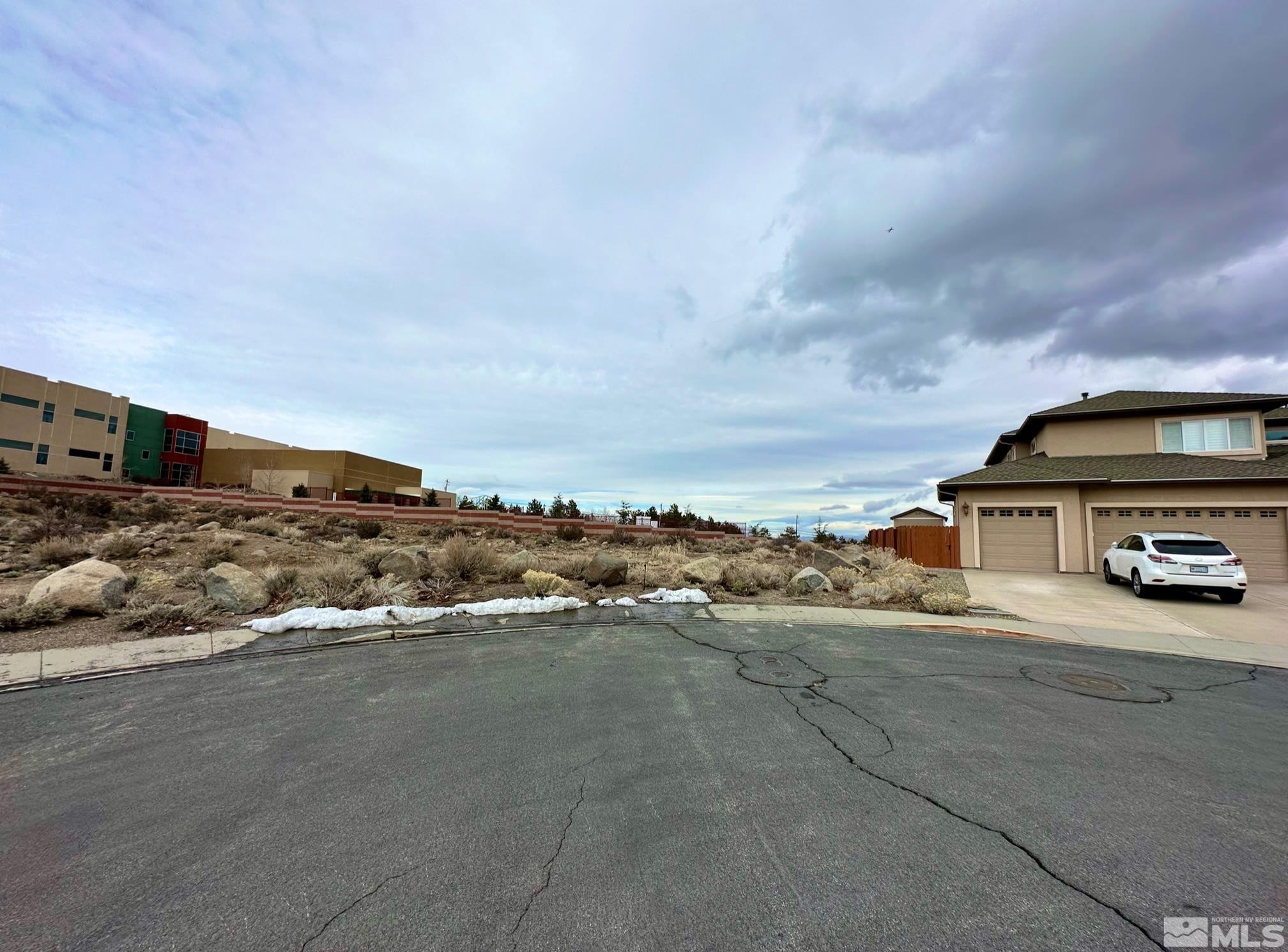 305 Kyle Court Reno, NV 89511 - Photo 3 of 8 a car parked on the side of the road