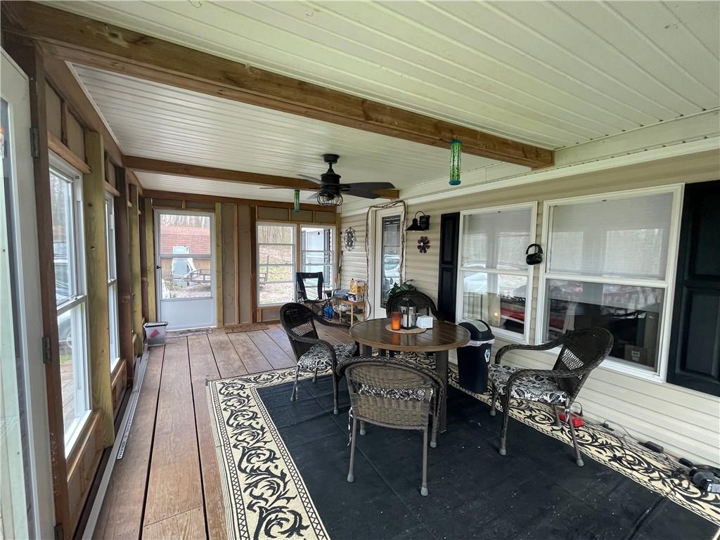 786 Deckards Run Road Utica, PA 16362 - Photo 3 of 29 a living room with furniture fireplace and a table