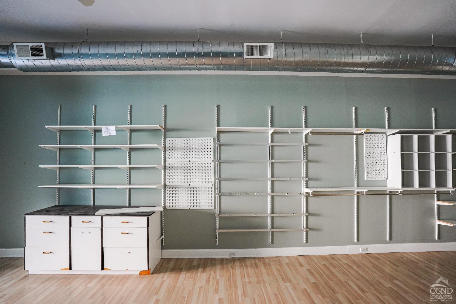 438 Warren Street Hudson, NY 12534 - Photo 7 of 21 a view of a wooden closet