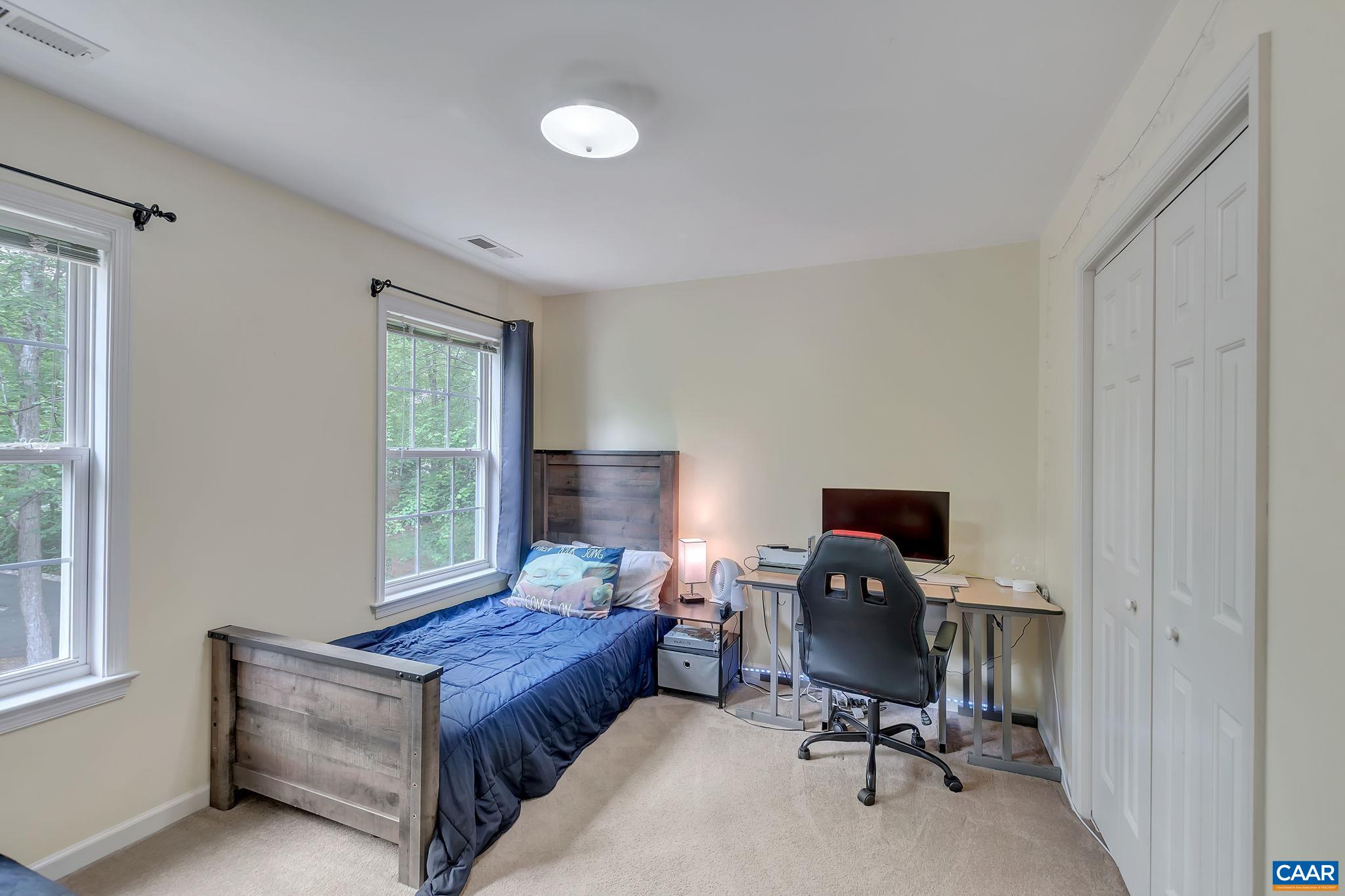 460 Northridge Road Ruckersville, VA 22968 - Photo 22 of 40 a view of a workspace with furniture and a window