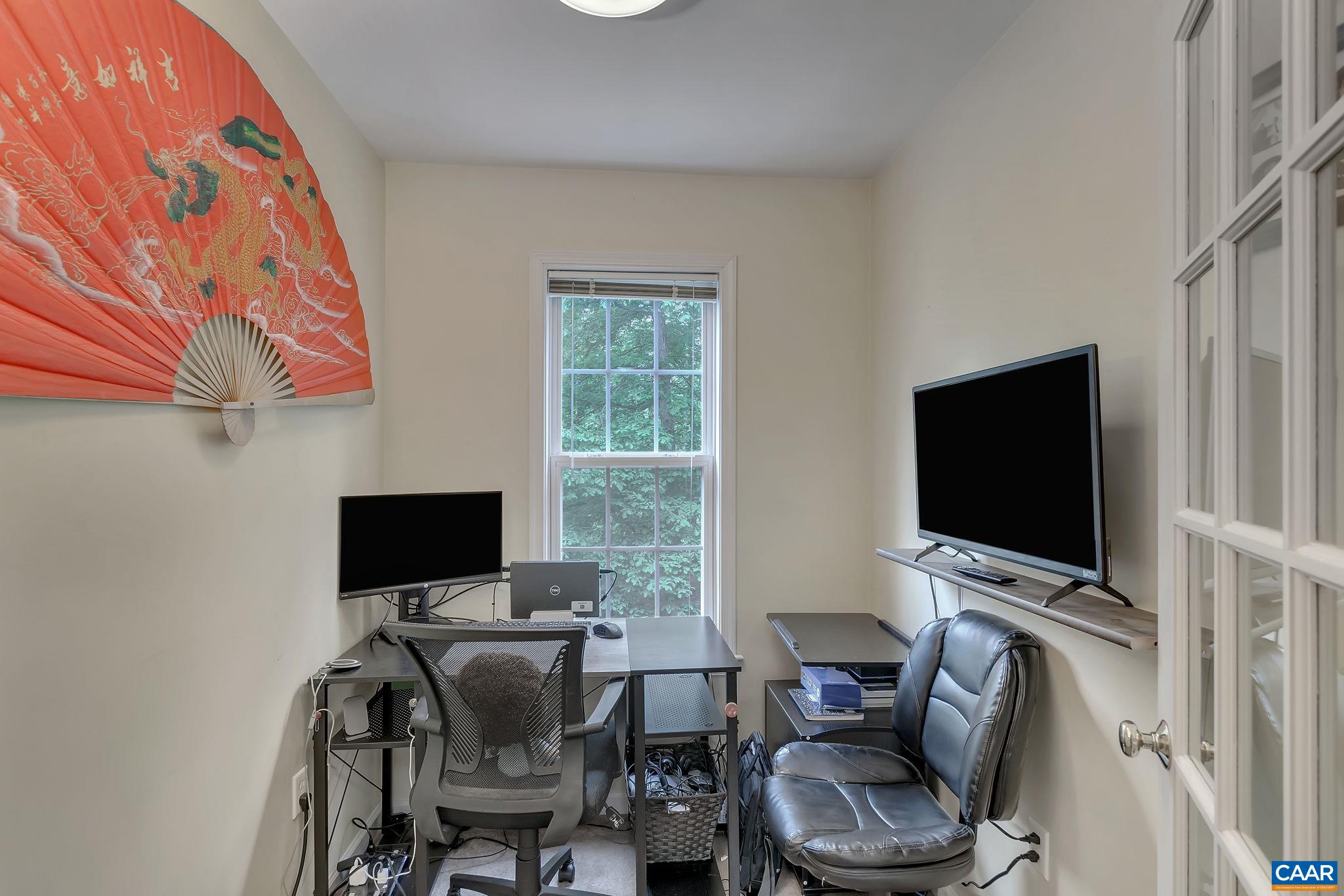 460 Northridge Road Ruckersville, VA 22968 - Photo 23 of 40 a view of a livingroom with furniture and a flat screen tv