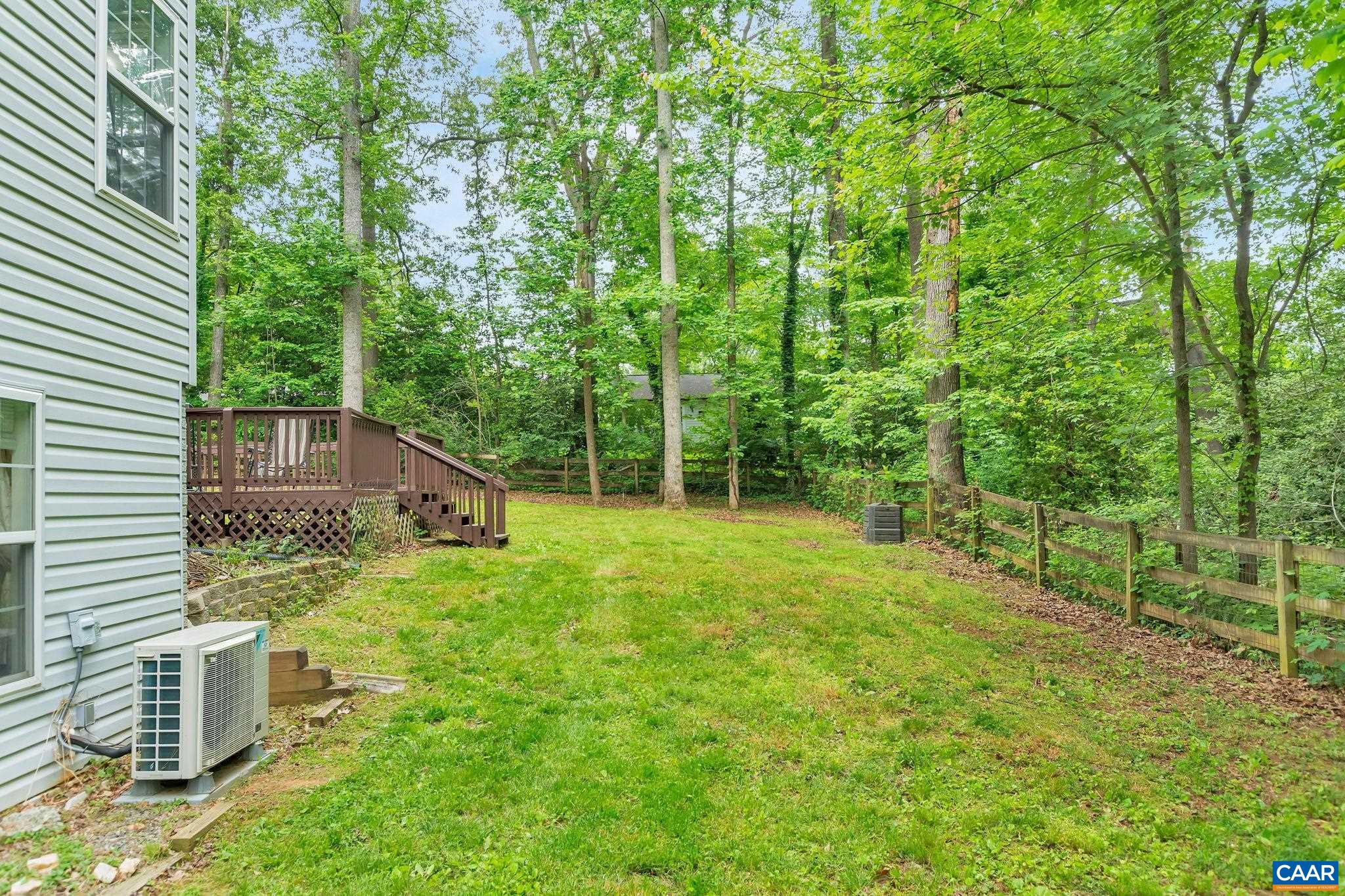 460 Northridge Road Ruckersville, VA 22968 - Photo 33 of 40 a view of a backyard with plants and large trees
