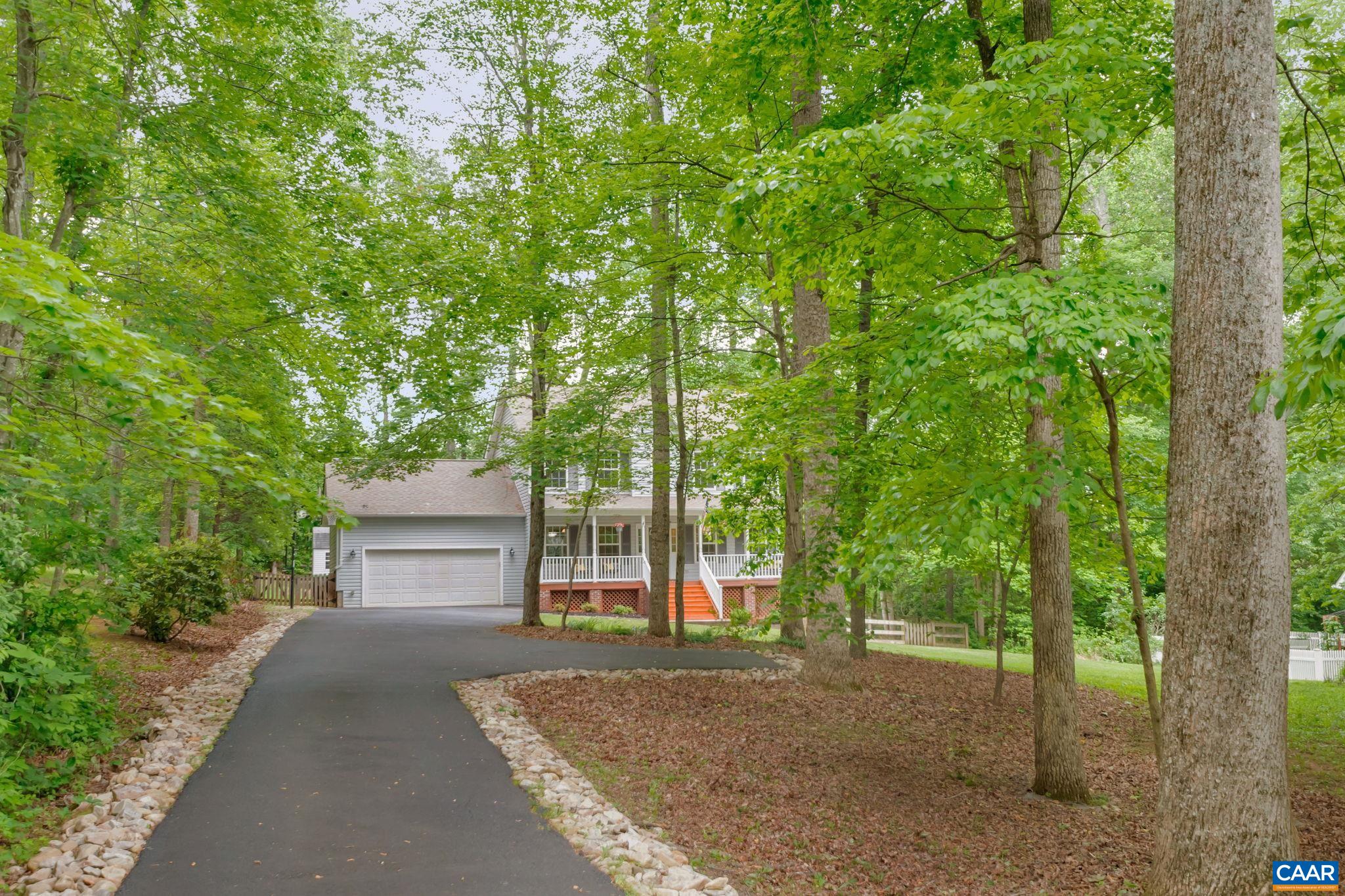 460 Northridge Road Ruckersville, VA 22968 - Photo 36 of 40 a view of a house with a backyard
