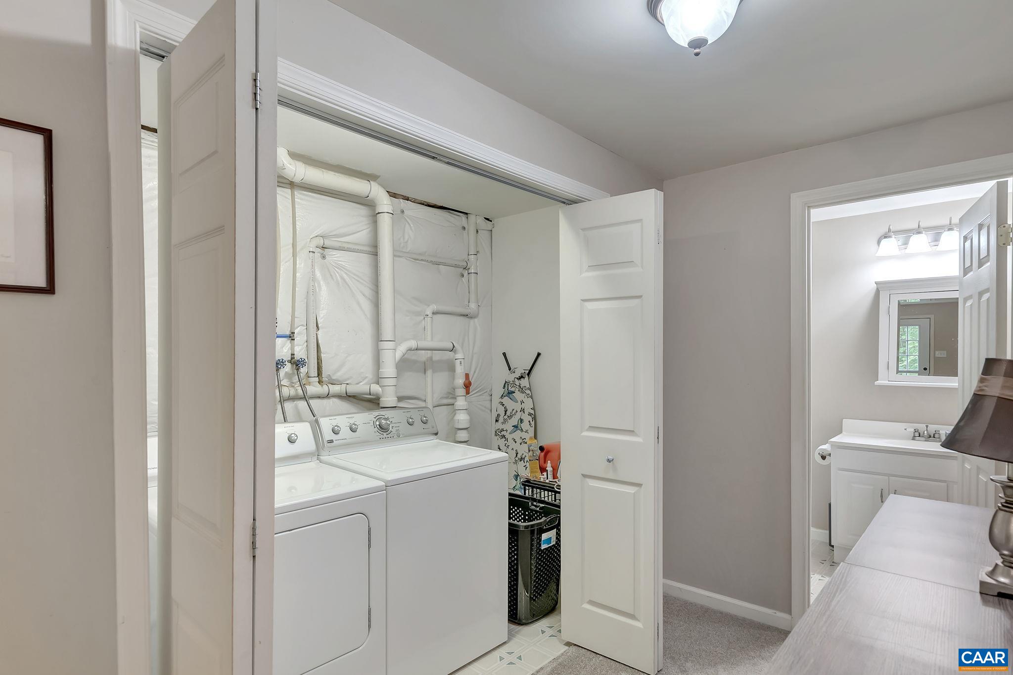 460 Northridge Road Ruckersville, VA 22968 - Photo 37 of 40 a bathroom with a sink a mirror and a vanity