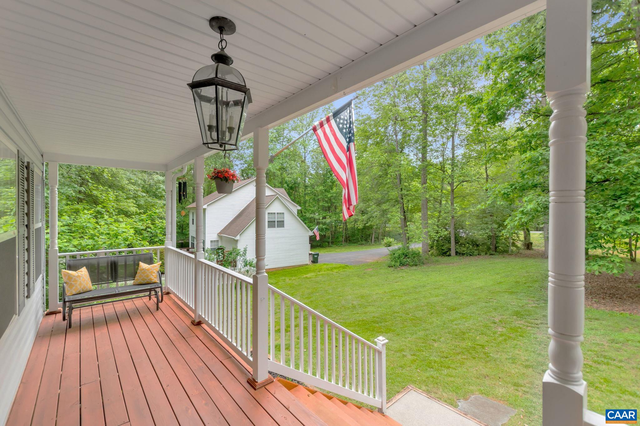 460 Northridge Road Ruckersville, VA 22968 - Photo 6 of 40 a view of a deck with couches and wooden floor