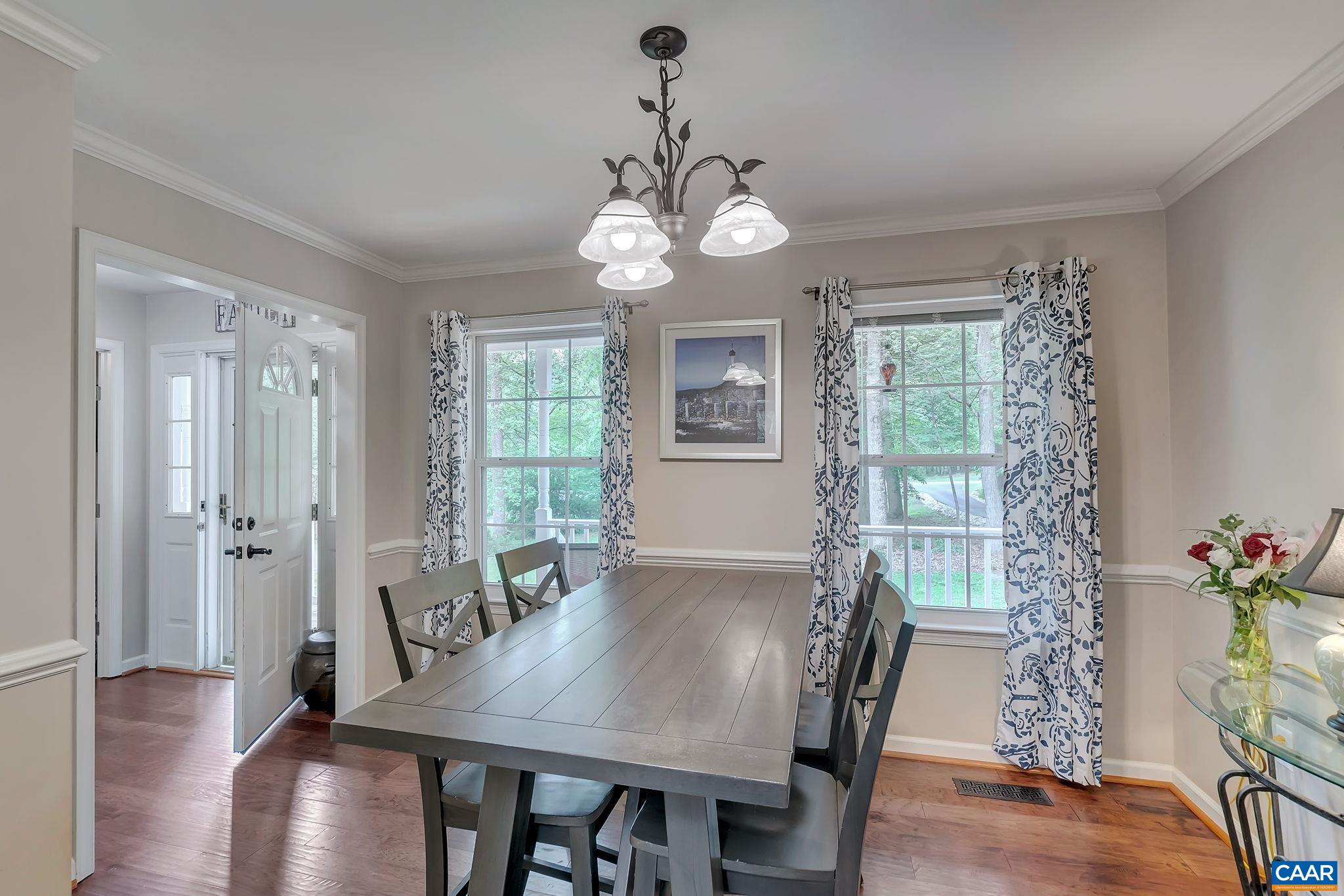 460 Northridge Road Ruckersville, VA 22968 - Photo 10 of 40 a view of a dining room with furniture window and wooden floor