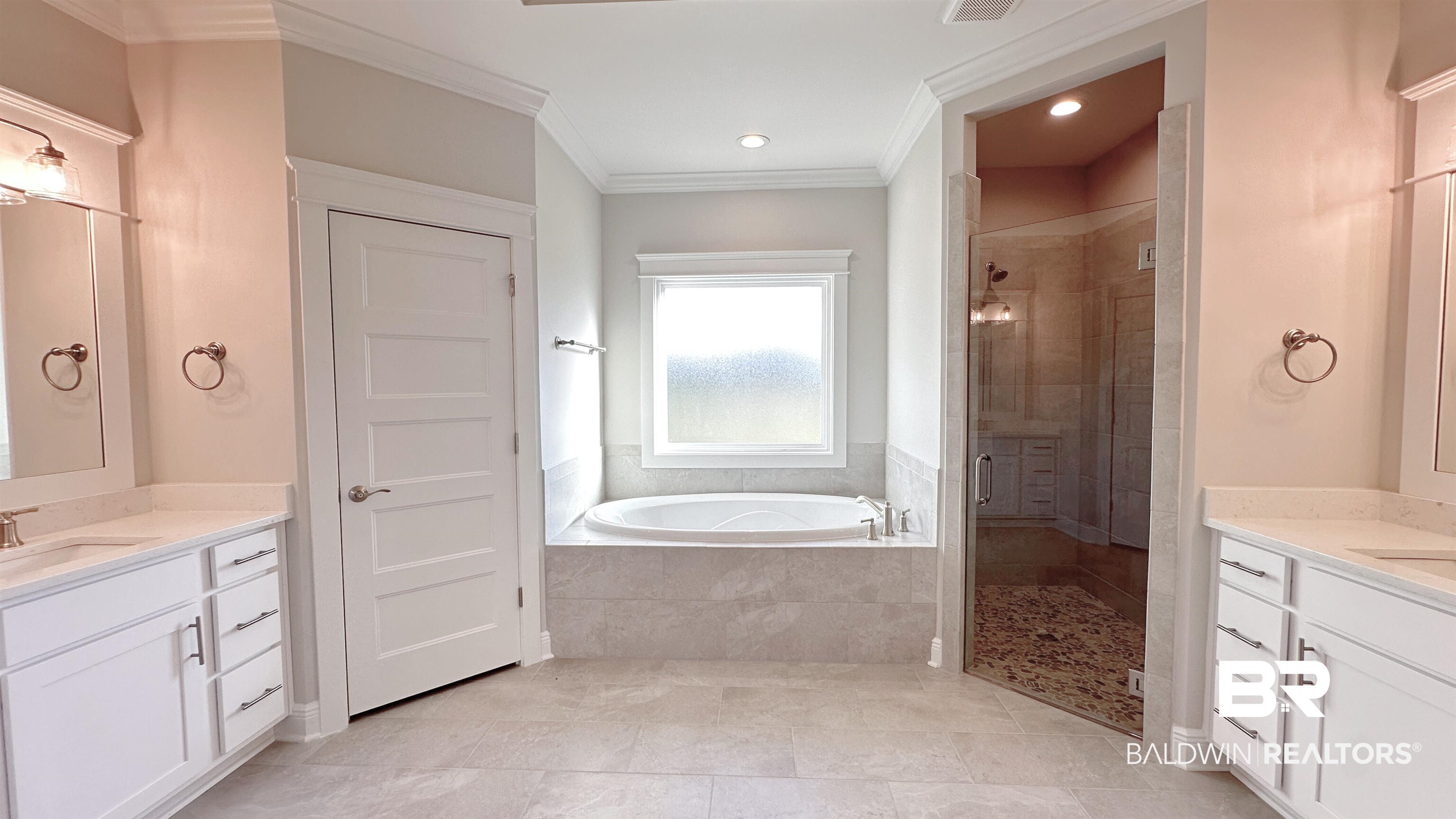 126 Daybreak Trail Fairhope, AL 36532 - Photo 13 of 34 Full bathroom featuring two vanities, a stall shower, crown molding, a bath, and light tile patterned floors
