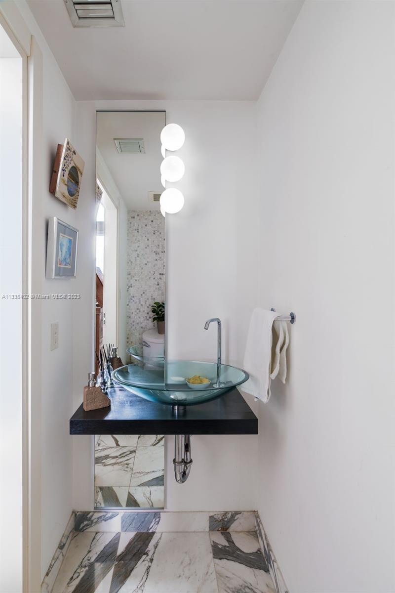 200 Biscayne Blvd Way, Unit 1404 Miami, FL 33131 - Photo 24 of 32 a view of a workspace with furniture