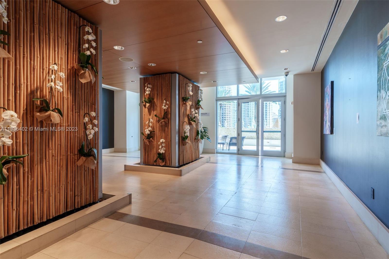 200 Biscayne Blvd Way, Unit 1404 Miami, FL 33131 - Photo 27 of 32 a view of an entryway with wooden floor